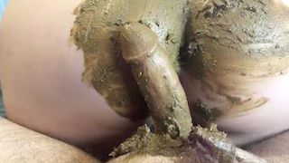 Scat milf pooping on a cock then receives messy cumshot on her asshole